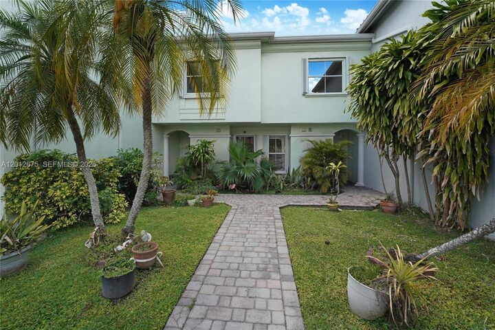 Property Photo:  12348 NW 11th Ln 1010  FL 33182 