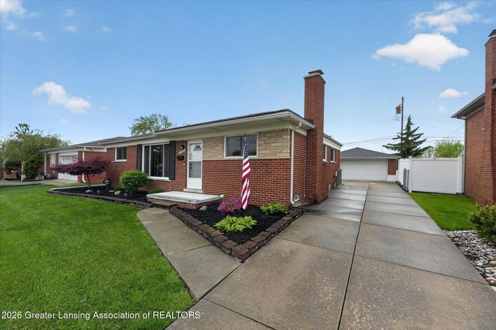 Property Photo:  7709 Carrousel Boulevard  MI 48185 