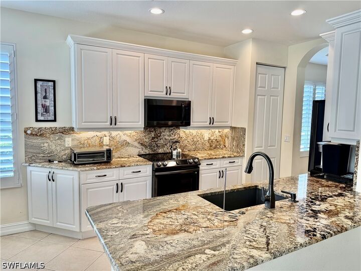 Property Photo: 14478 Sterling Oaks Drive FL 34110