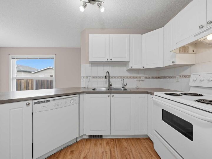 Property Photo:  128 Taradale Drive NE  AB T3J 5A9 