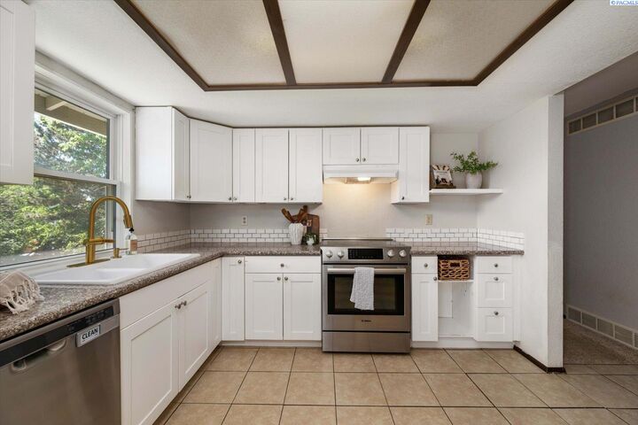 Property Photo:  8309 W Deschutes Ave  WA 99336 