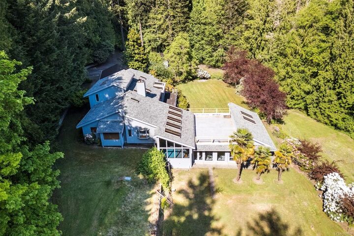 Property Photo: 5630 Batu Rd BC V8Z 6K5