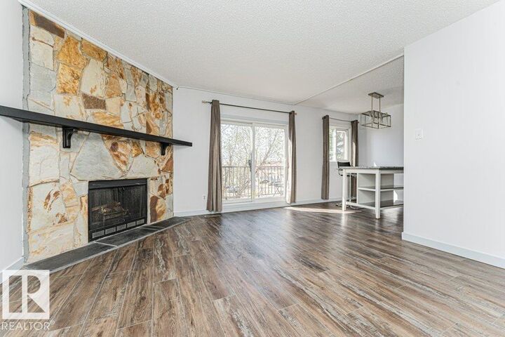 Property Photo:  14004 26 Street NW 308  AB T5Y 1Y4 