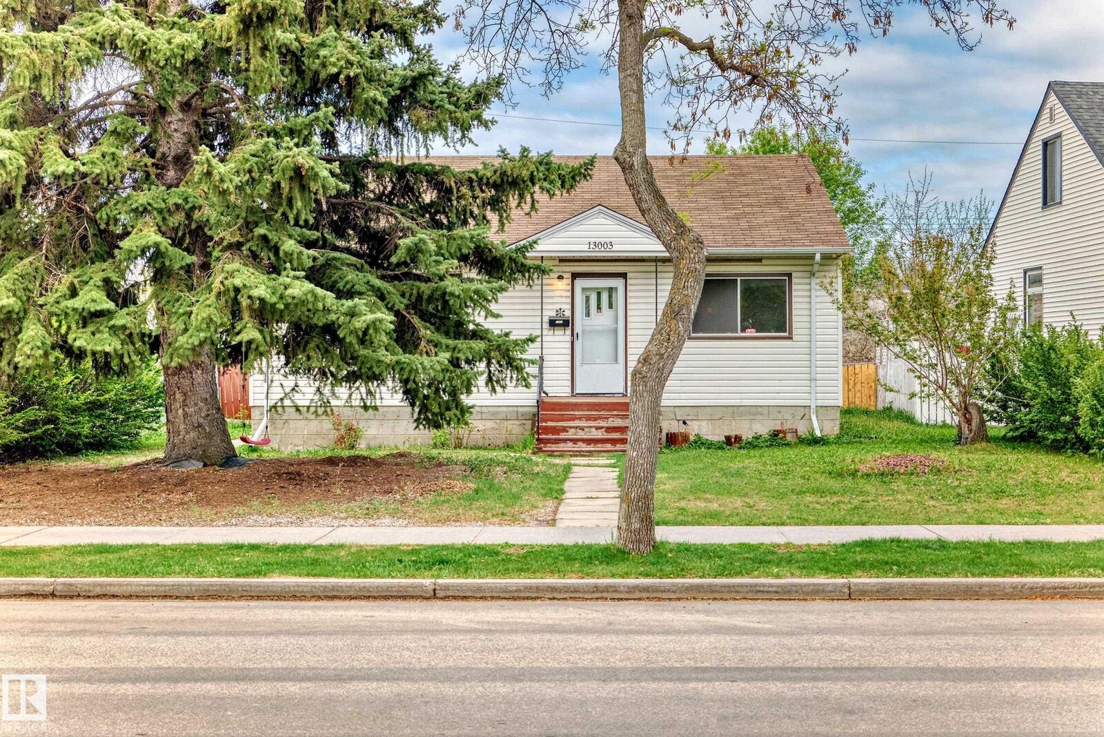 Property Photo:  13003 Sherbrooke Avenue NW  AB T5L 4E6 