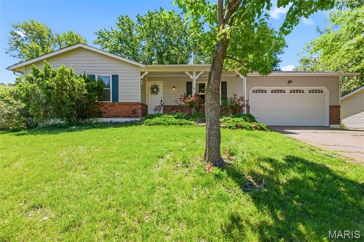 Property Photo:  806 Pepper Lane  MO 63366 