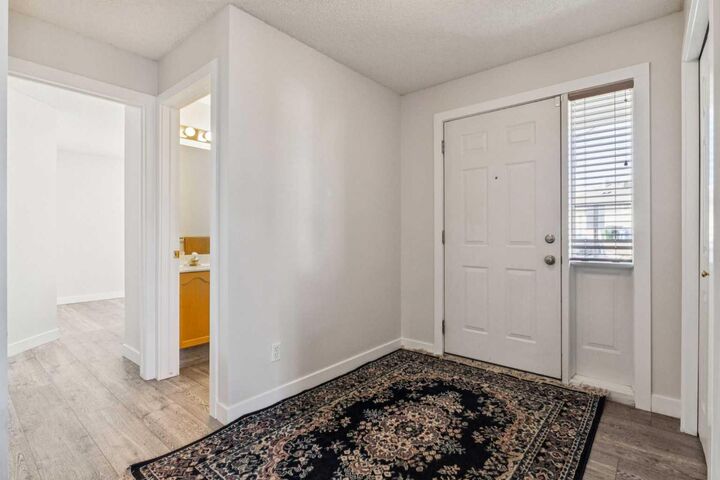 Property Photo:  7171 Coach Hill Road SW 3105  AB T3H 3R7 