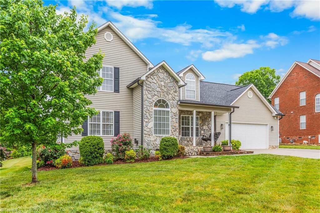 Property Photo:  203 Naola Court  NC 27263 