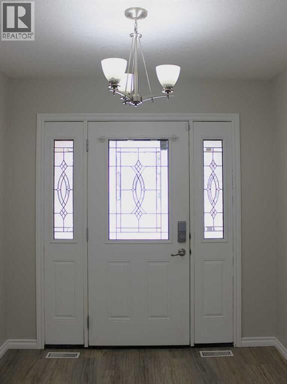 Property Photo:  8 South Shore Close East  AB T1R 1R4 