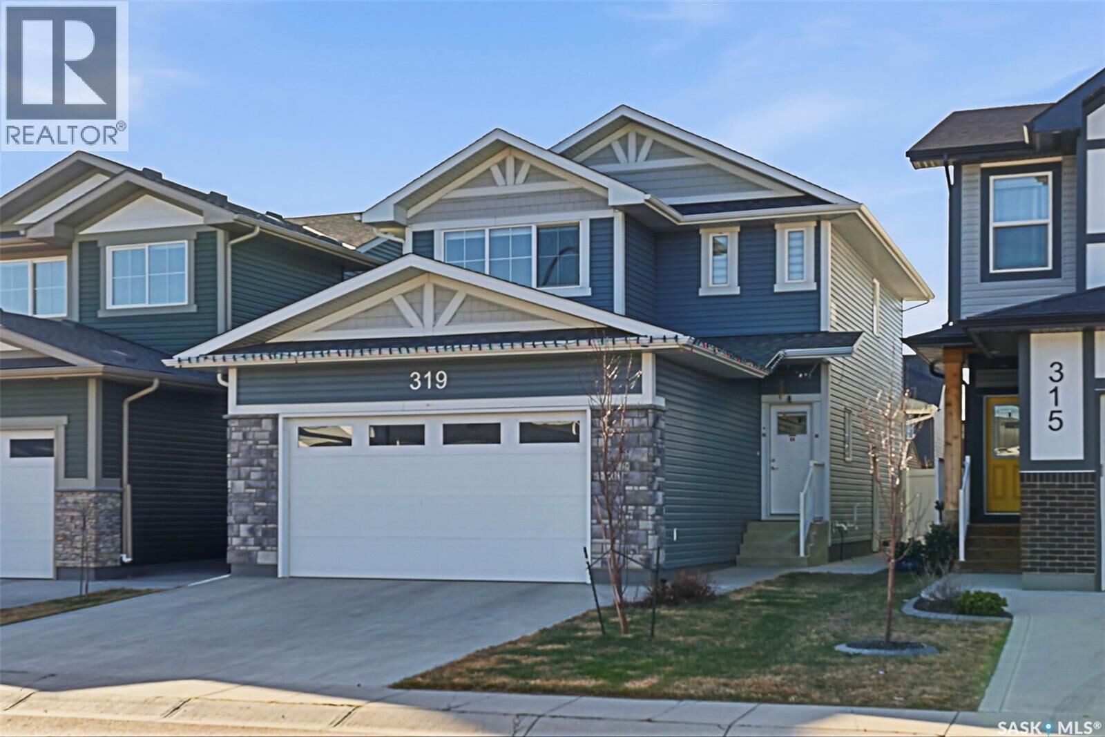 Property Photo:  319 Skopik Crescent  SK S7V 0V5 