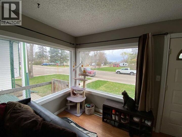 Property Photo:  23 Pine Avenue West  AB T1A 0A1 