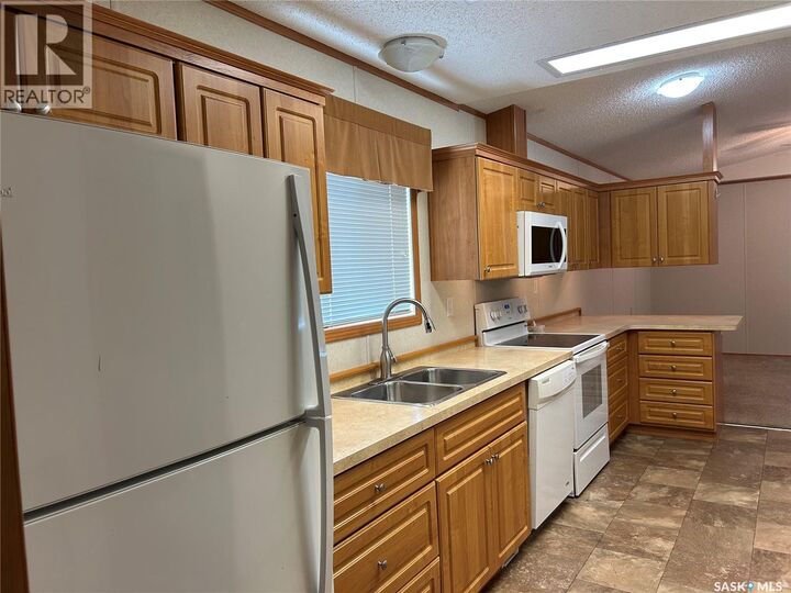 Property Photo:  17 2004 Alice Road  SK S4A 3A7 