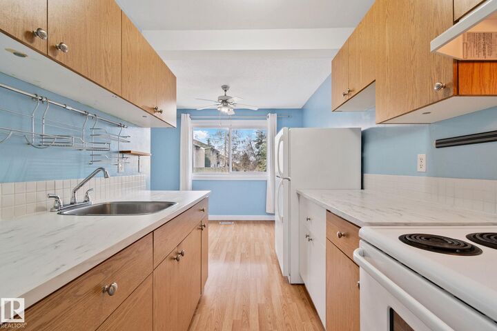 Property Photo:  857 Abbottsfield Road NW  AB T5W 4R4 