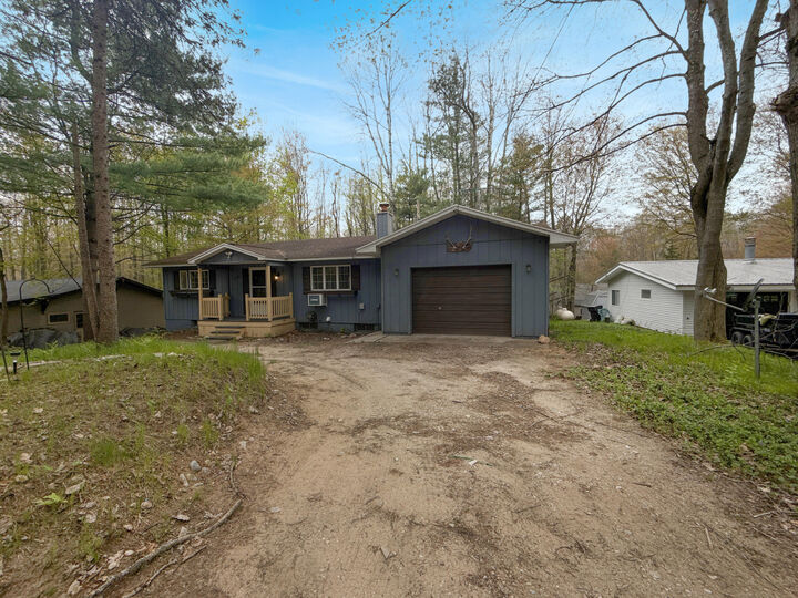 Property Photo:  8281 Pine Tree Trail  MI 49346 