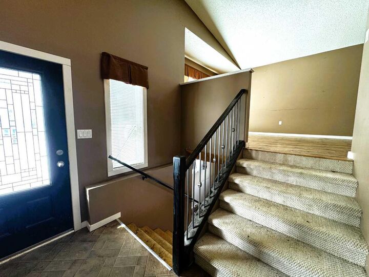 Property Photo:  4320 Caribou Crescent  AB T0G 2K0 