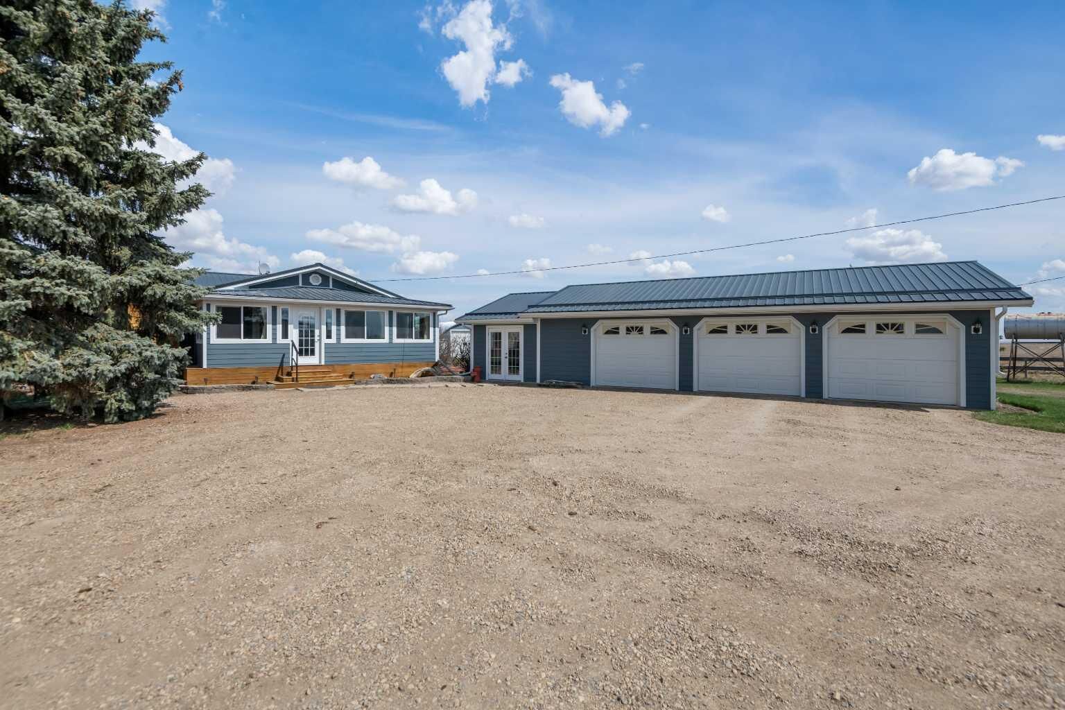 Property Photo:  274048 Rge Rd 261  AB T0M 0G0 