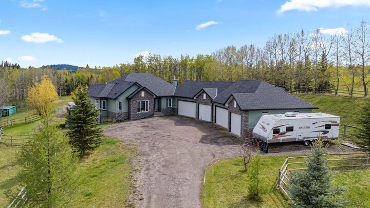 Property Photo:  288017 160 Avenue W  AB T0L 1W2 