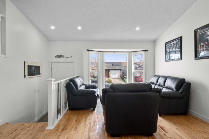Property Photo:  107 Cedargrove Way SW  AB T2W 4V1 