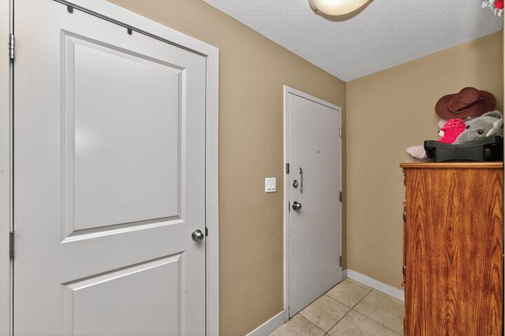 Property Photo:  6118 80 Avenue NE 1303  AB T3J 1B3 
