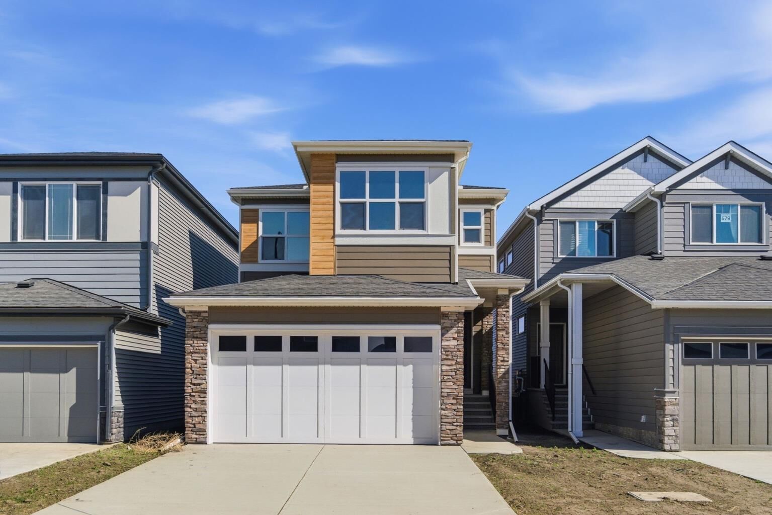 Property Photo:  675 Buffaloberry Manor SE  AB T3M 3Z3 