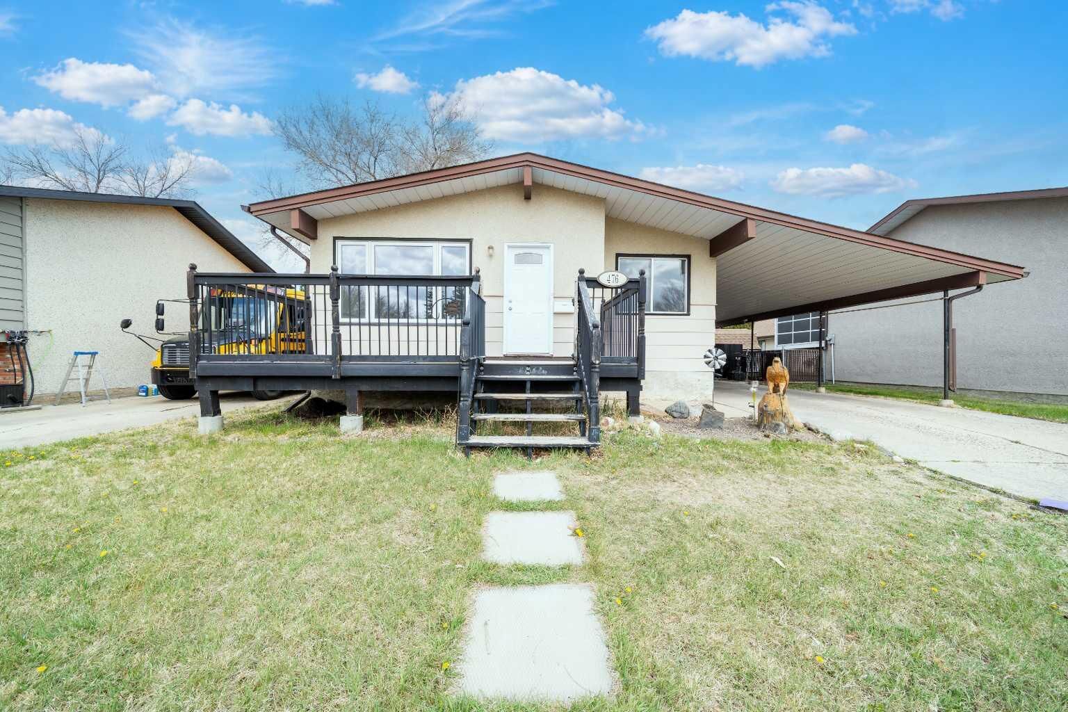 Property Photo:  476 18 Street NE  AB T1C 1G1 