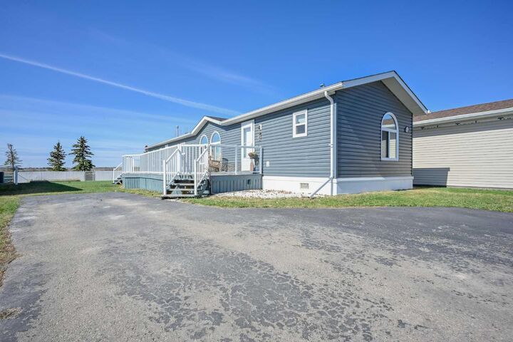 Property Photo:  547 Stewart Street  AB T8W 5K5 