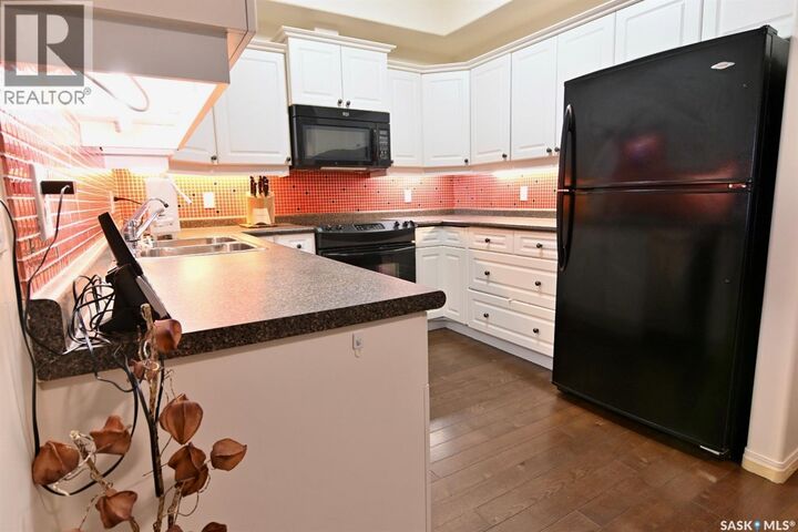 Property Photo:  106 110 Armistice Way  SK S7J 5L8 