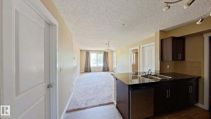 Property Photo:  3315 James Mowatt Trail SW 133  AB T6W 3L9 