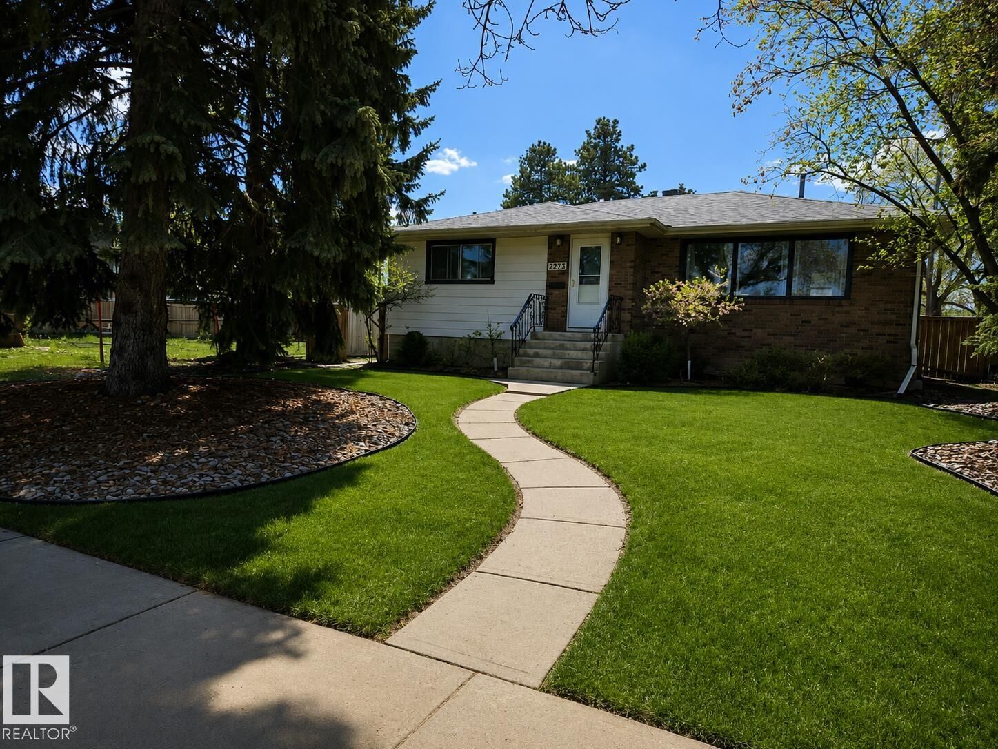 Property Photo:  8239 93A Avenue NW  AB T6C 1V5 