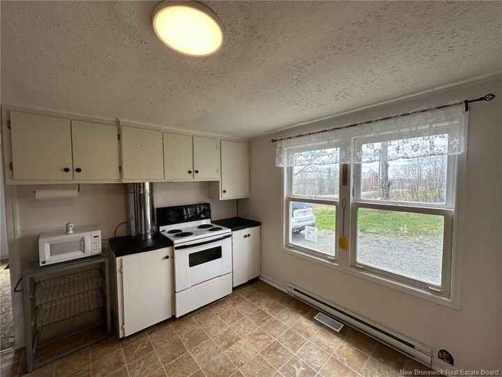 Property Photo:  3224 Route 104  NB E6E 1J4 