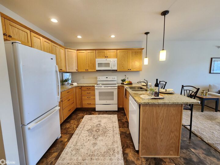 Property Photo:  809 7th Ave N #311  IA 50428 