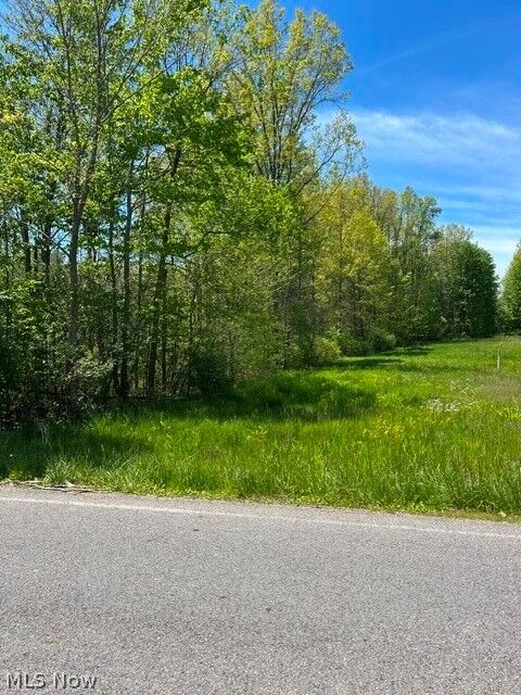Property Photo:  8086 S Raccoon Road  OH 44406 