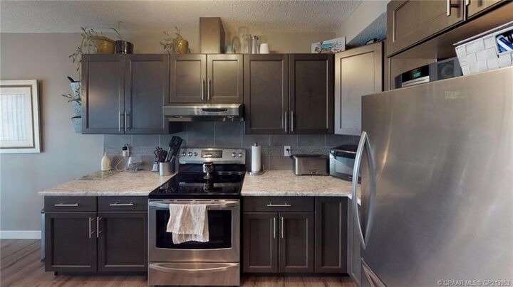 Property Photo:  8451 101 Avenue  AB T8X 0R1 