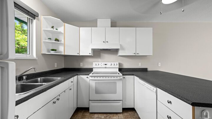 Property Photo:  2767 Muir Rd 303  BC V9N 9A1 