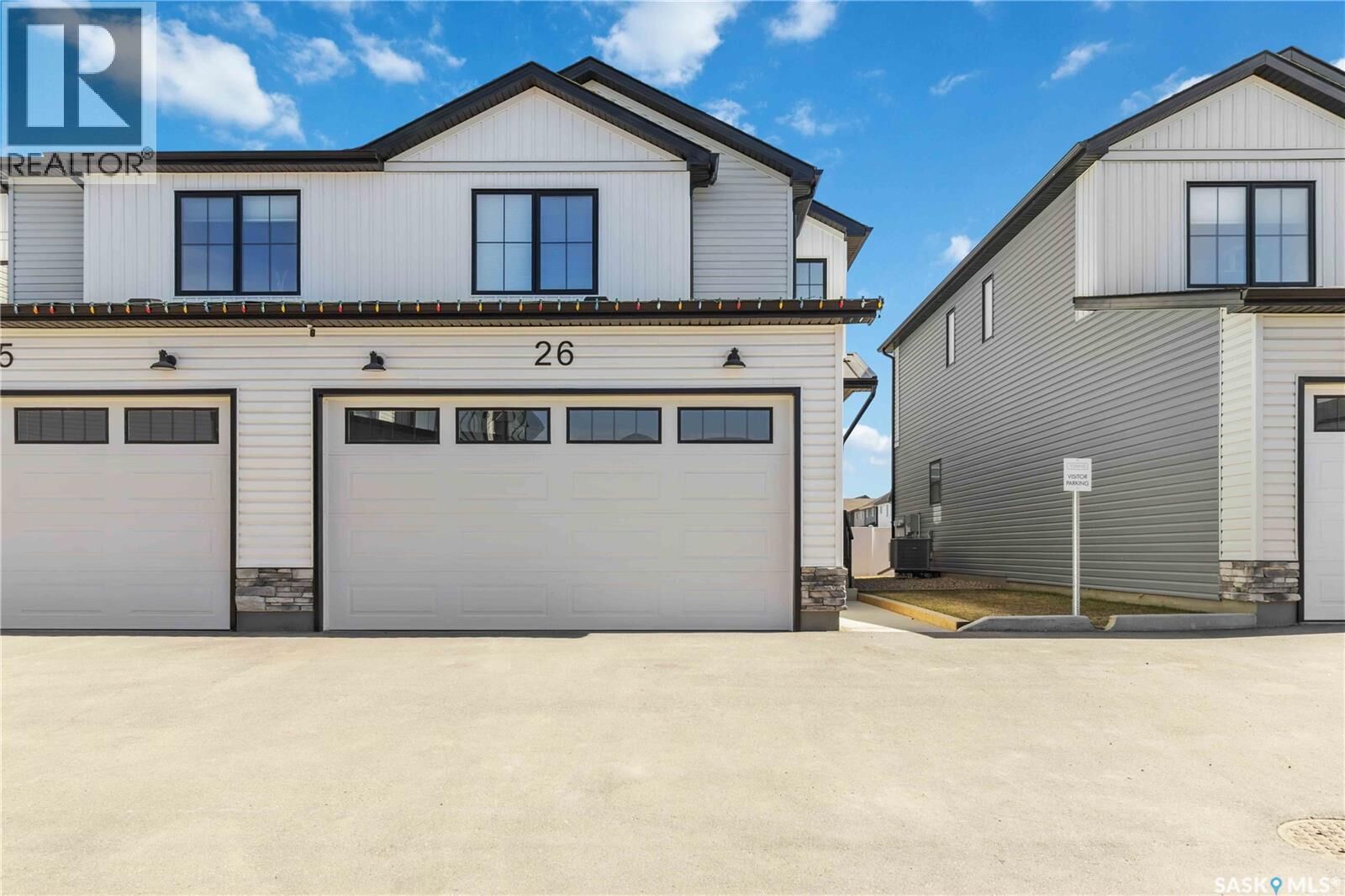 Property Photo:  26 625 Dagnone Crescent  SK S7V 1K9 