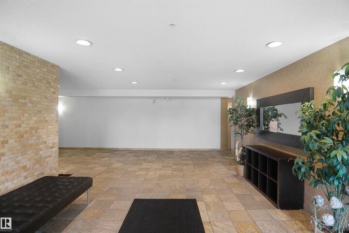 Property Photo:  15211 139 Street NW 403  AB T6V 0A1 