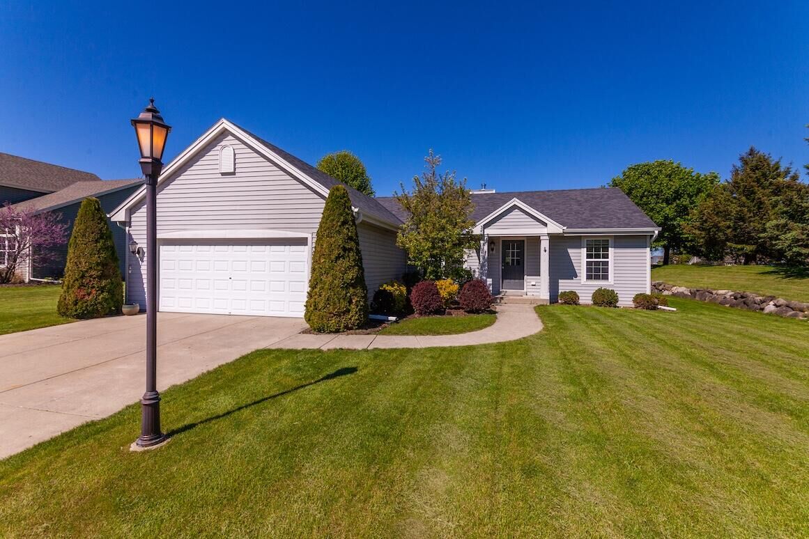 Property Photo:  1280 Wrenfield Way  WI 53066 