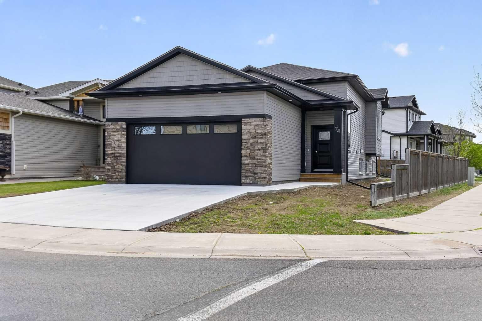 Property Photo:  74 Riverpark Boulevard W  AB T1K 5X4 