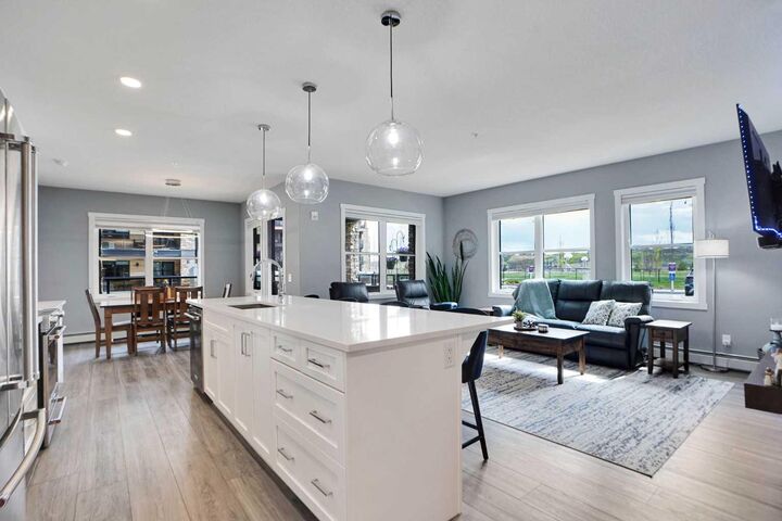 Property Photo:  55 Wolf Hollow Crescent SE 105  AB T2X 5K9 