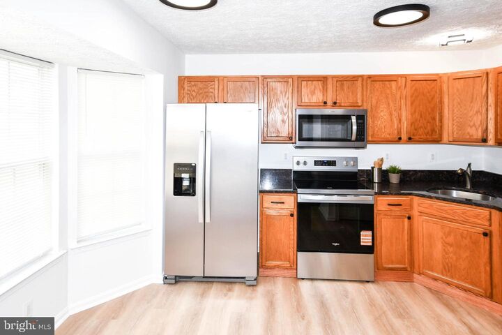 Property Photo:  6907 Wildrose Court  MD 20747 