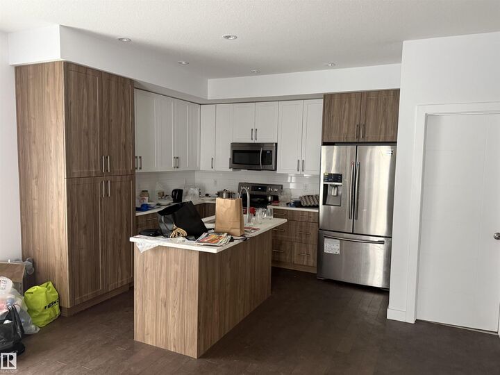 Property Photo:  11402 133 Avenue NW  AB T5E 1E3 