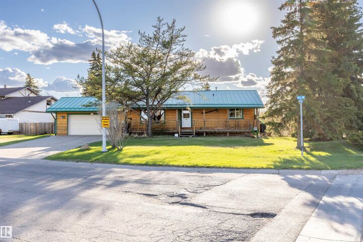Property Photo: 100 Mill Road AB T8R 1P2