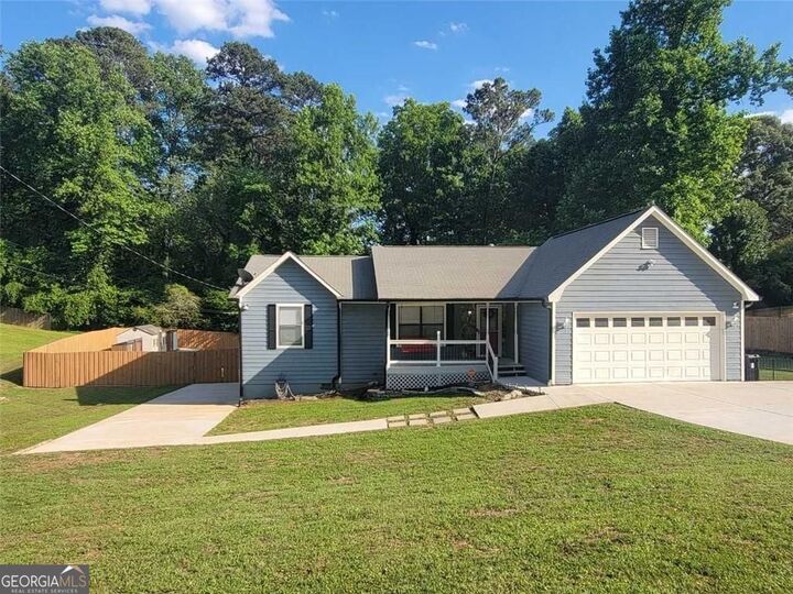 Property Photo:  5104 Carole Place SW  GA 30087 