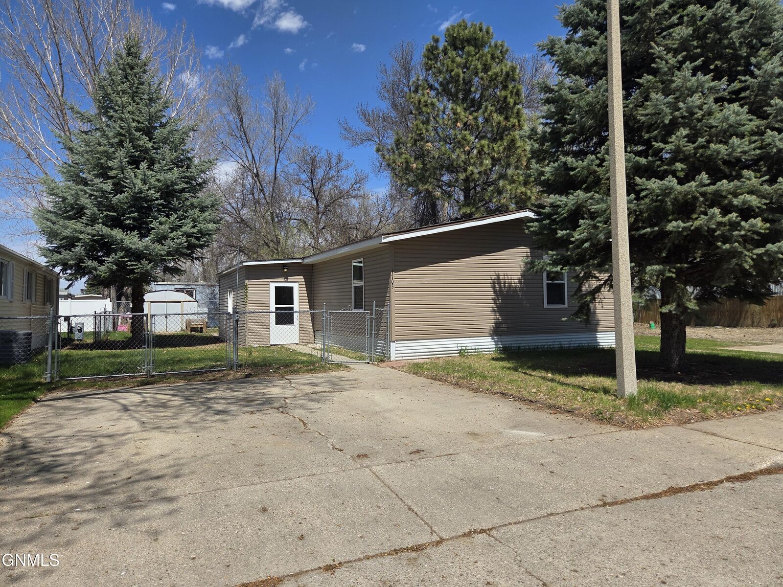 Property Photo:  1119 University Drive 1705  ND 58504 