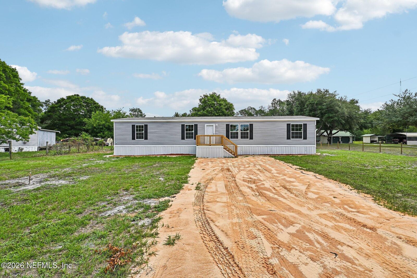 Property Photo:  6771 SW County Road 225  FL 32091 