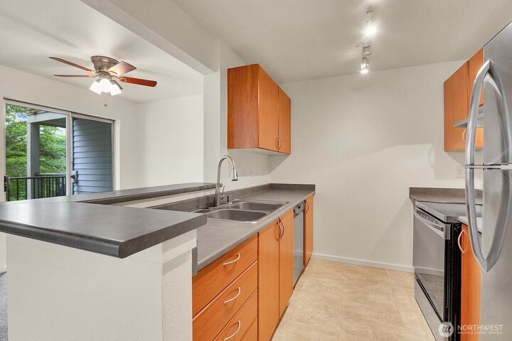Property Photo:  15415  35th Avenue W F202  WA 98087 