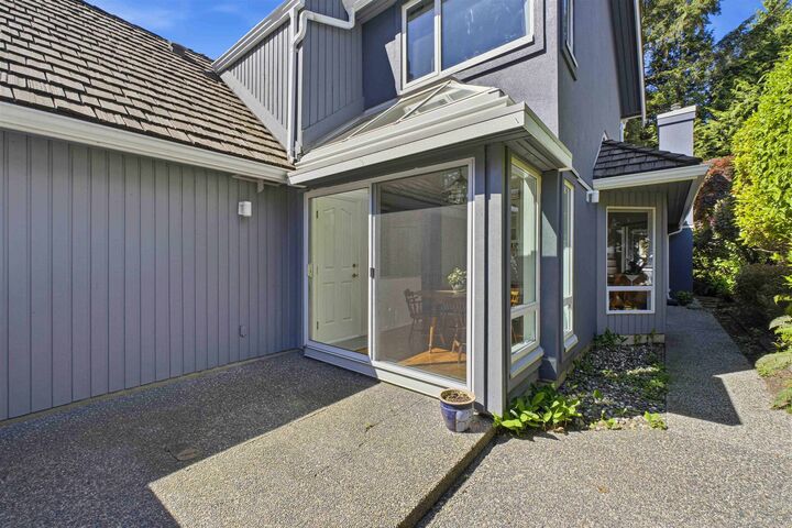 Property Photo: 1925 Indian River Crescent 5 BC V7G 2P7