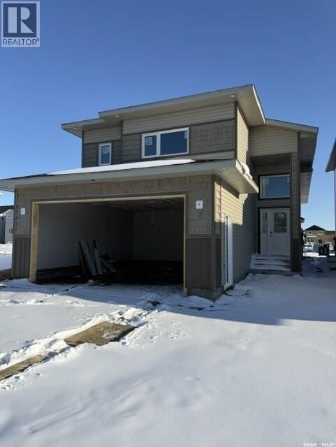 Property Photo: 211 Taskamanwa Street SK S7V 1X3