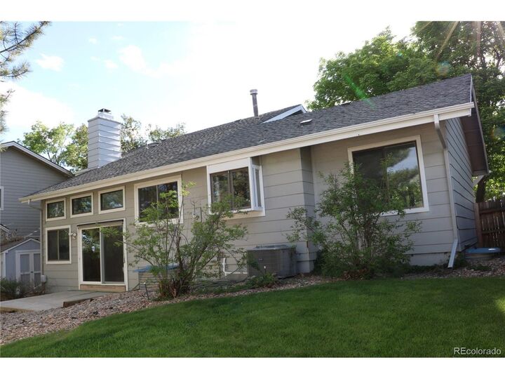 Property Photo:  1508 Daphne St  CO 80020 