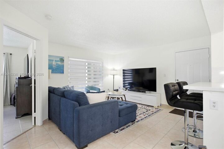 Property Photo:  400 Palm Cir W 102  FL 33025 