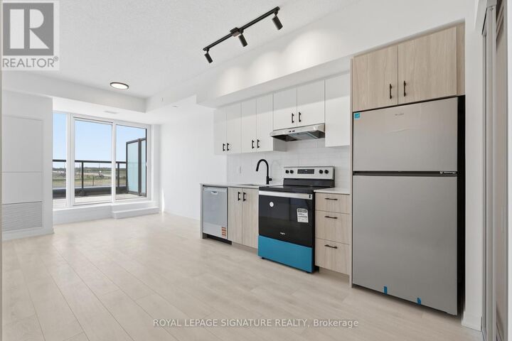 Property Photo:  4853 Thomas Alton Boulevard 415  ON L7M 0H3 